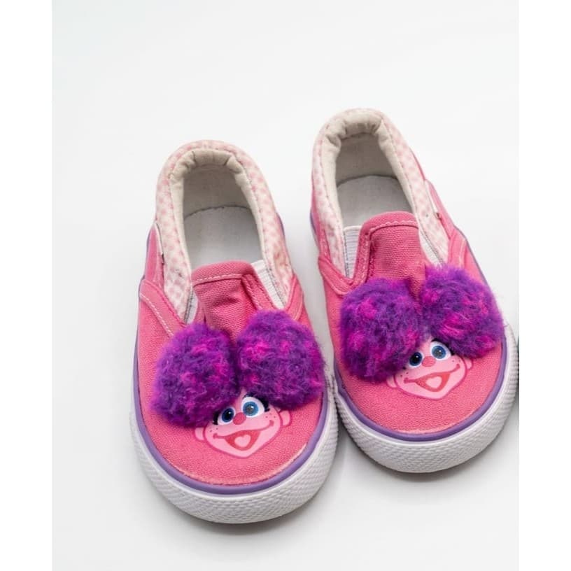 Zapatos con muñeco de peluche